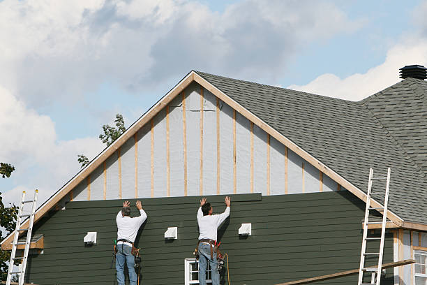 Professional Storm Damage Siding Repair technician working in Swannanoa, NC